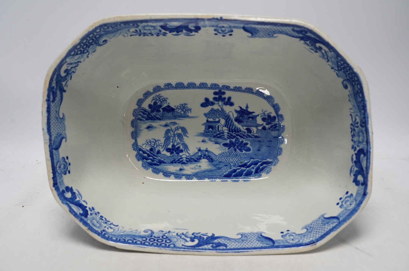 A Victorian Staffordshire blue and white pottery soup tureen and cover, together with a meat dish (2). Condition - tureen cover cracked